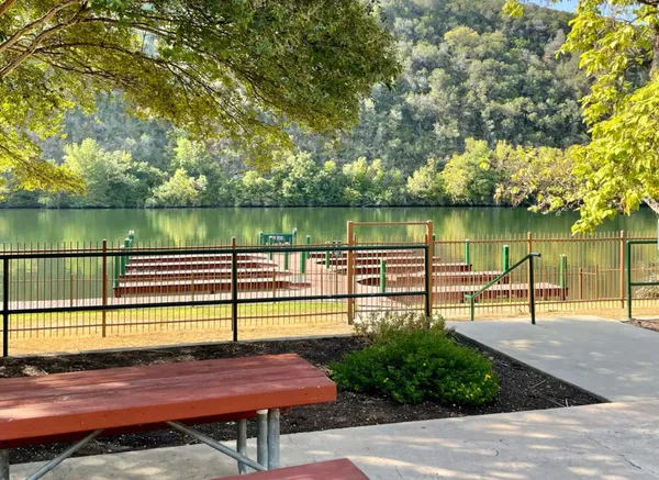 a view of a swimming pool with a patio