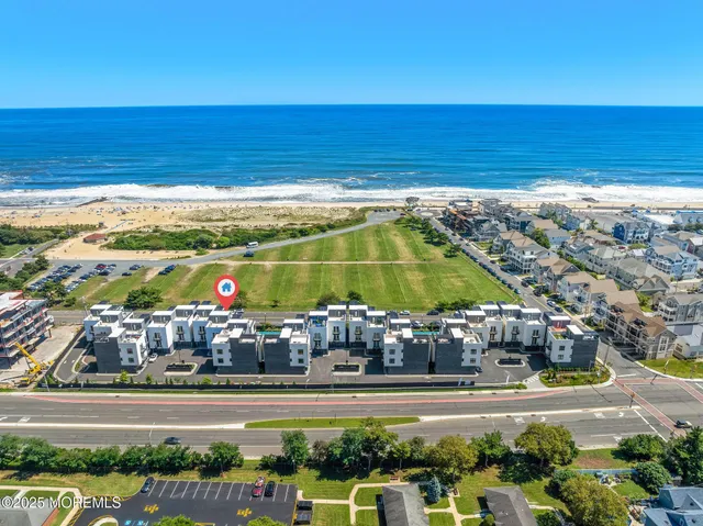 a view of an swimming pool with an ocean view