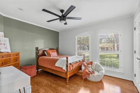 a bed room with a bed and a window