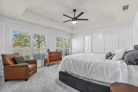 a bedroom with a bed and furniture