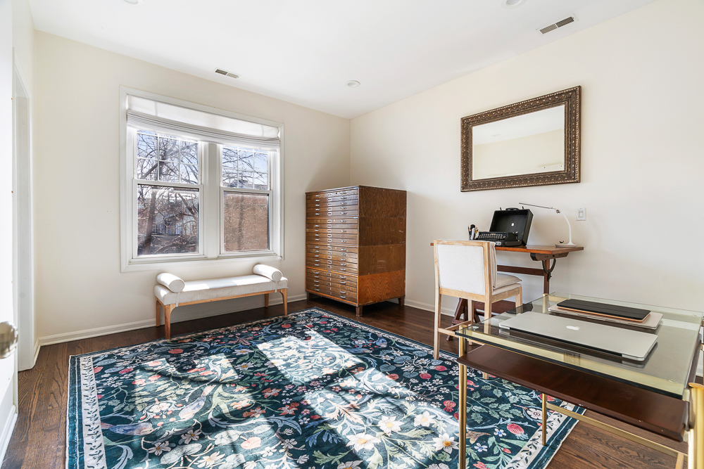 1002 West Altgeld Street, Unit 1002 Chicago, IL 60614 - Photo 18 of 39 a bedroom with furniture and a window