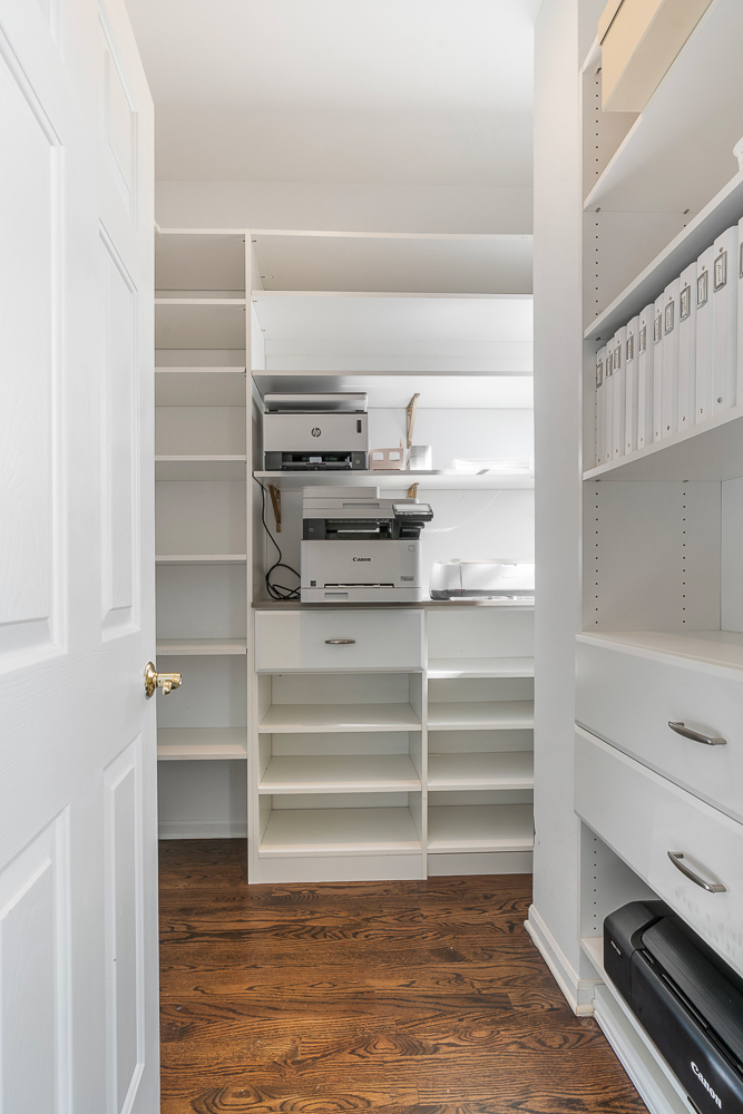 1002 West Altgeld Street, Unit 1002 Chicago, IL 60614 - Photo 20 of 39 a view of walk in closet with empty racks