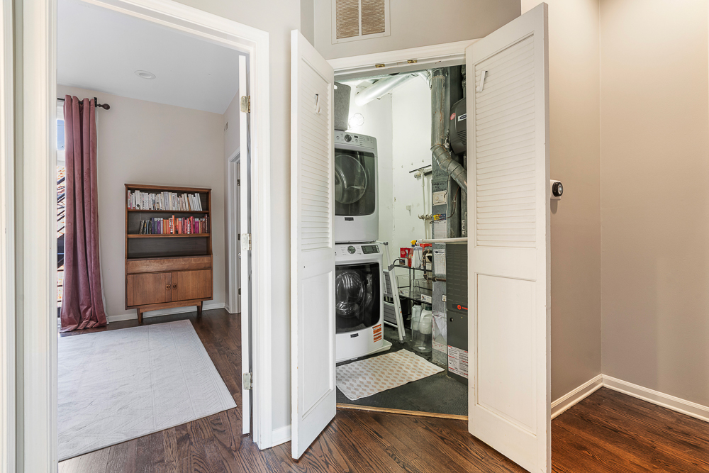 1002 West Altgeld Street, Unit 1002 Chicago, IL 60614 - Photo 24 of 39 a view of a hallway with living room and furniture