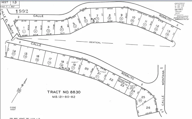 a view of a backyard of a house