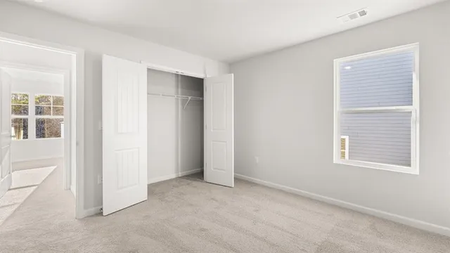 an empty room with windows