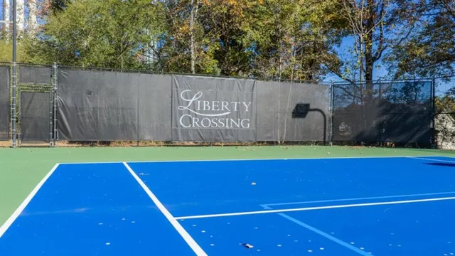 a view of a balcony with furniture