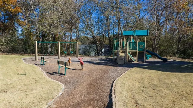 a view of a table and chairs in the outdoor space