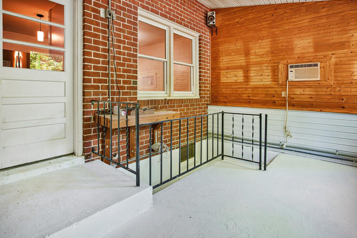 1016 Winsford Road Towson, MD 21204 - Photo 17 of 42 a view of a balcony with a stairs
