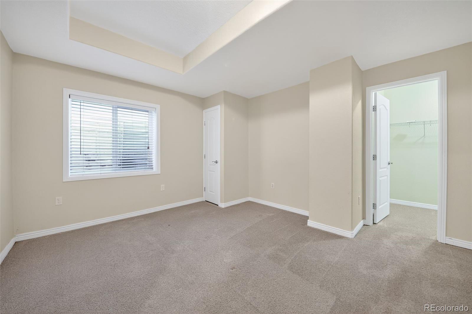 11036 Glengate Circle Highlands Ranch, CO 80130 - Photo 10 of 31 a view of an empty room with a window