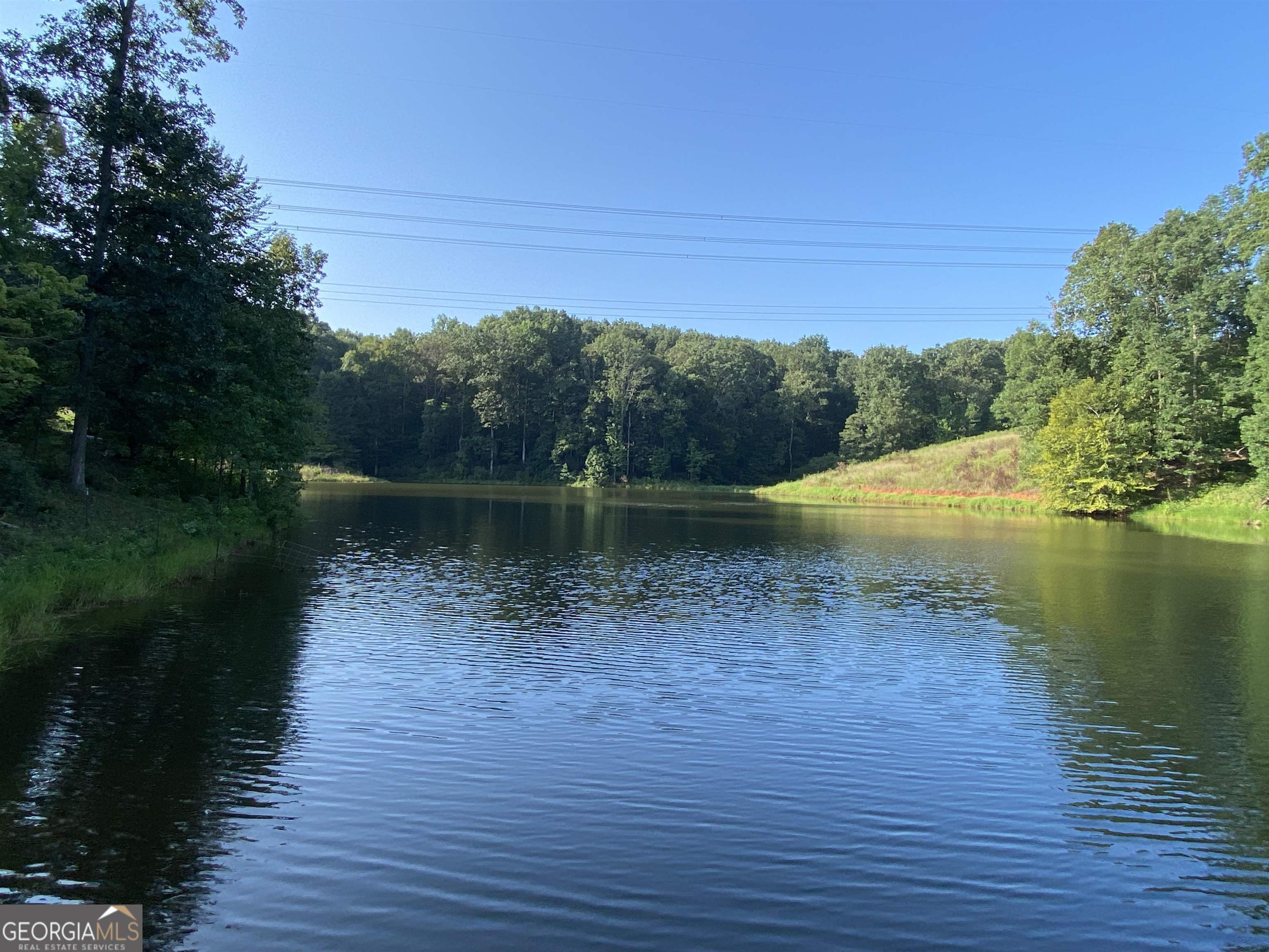 525 Caudell Road Homer, GA 30547 - Photo 1 of 1 a view of a lake with a yard