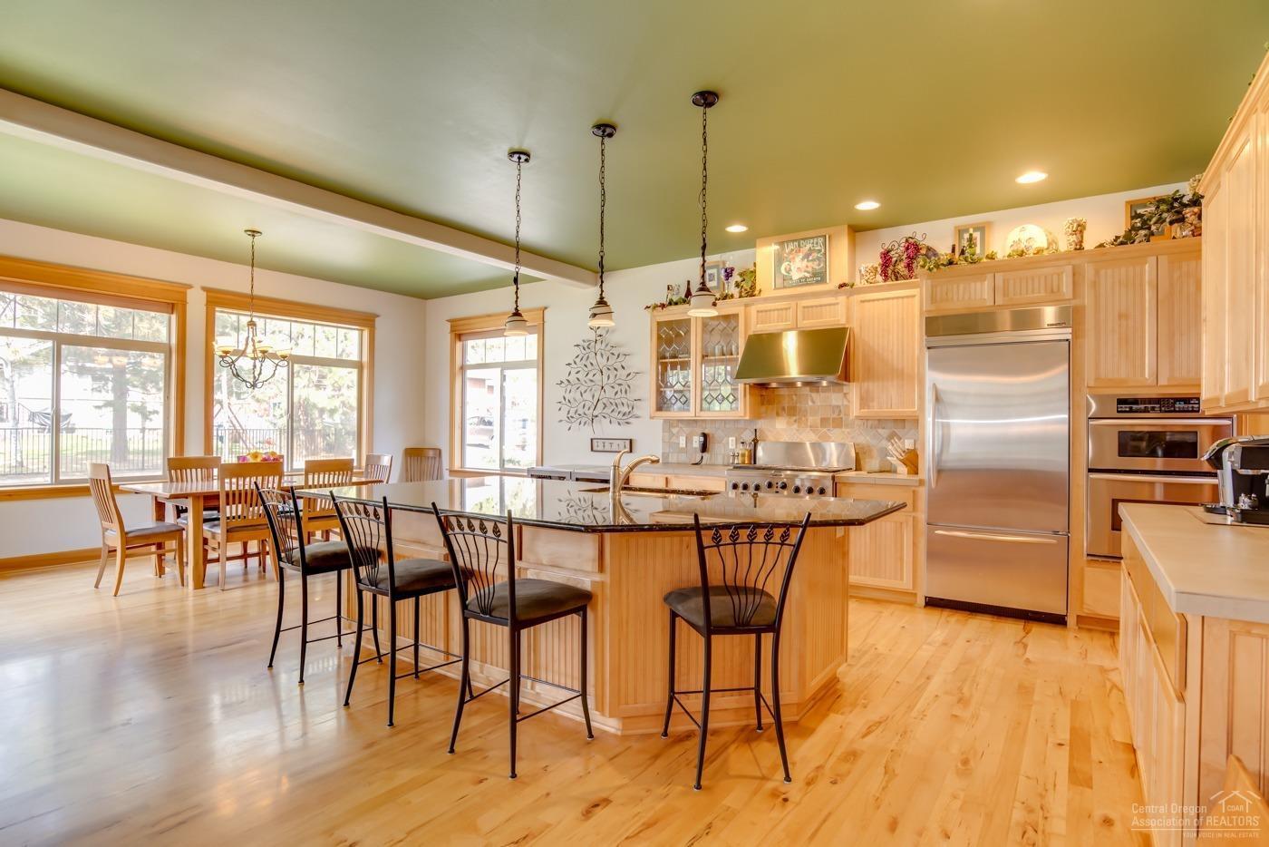 2429 Northwest Skyline Ranch Road Bend, OR 97703 - Photo 5 of 25 Lively bright kitchen.