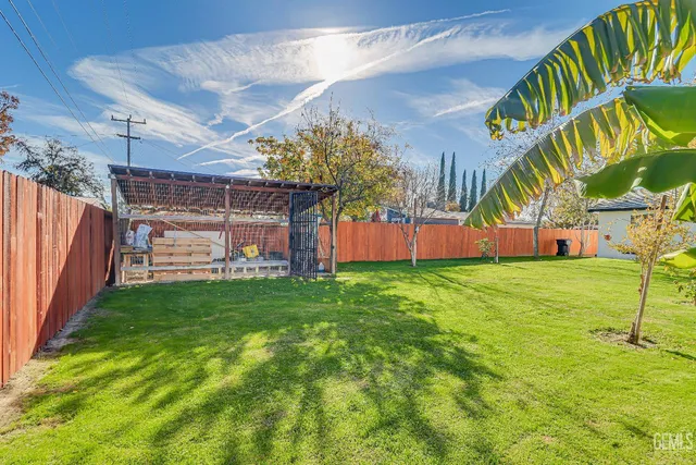 a view of a backyard with a garden