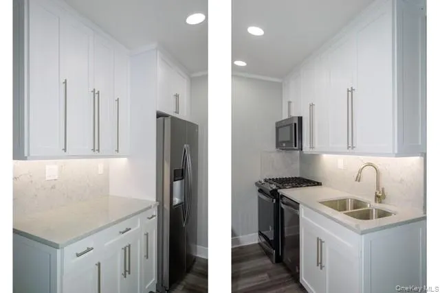 a kitchen that has a sink and a refrigerator