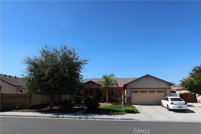 a car parked in front of a house