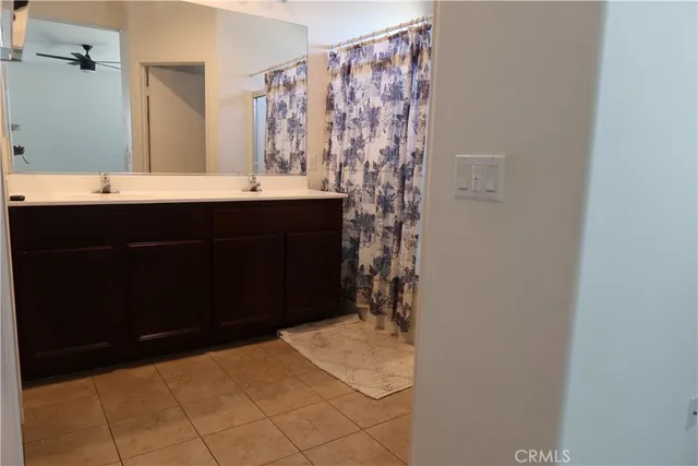 a bed room with furniture and a window