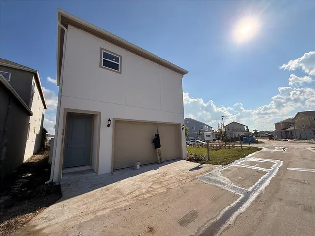 a view of a house with a patio