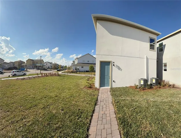a front view of a house with lake view