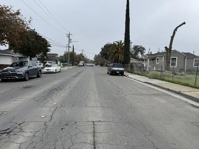 a view of a street in front of a house
