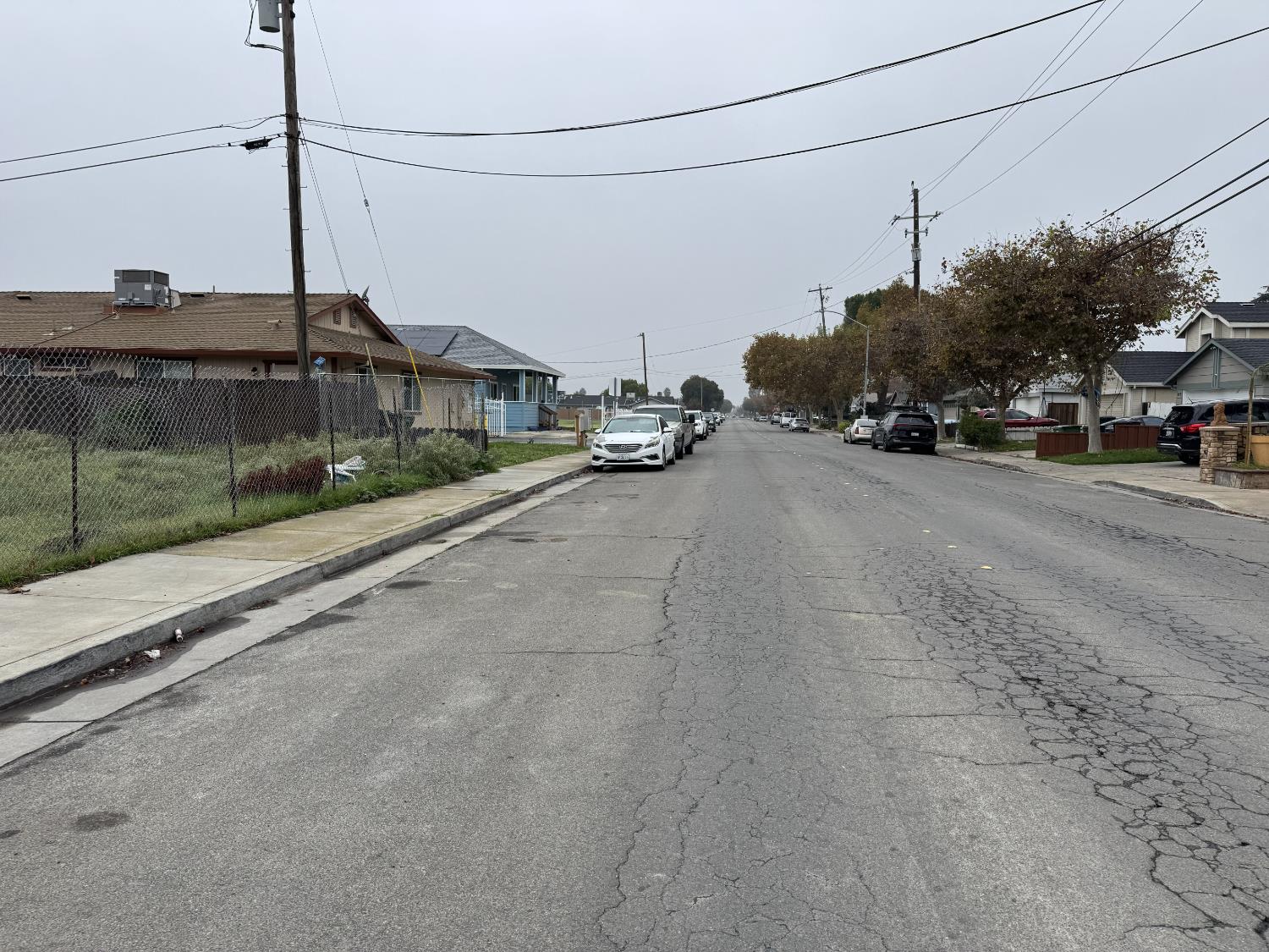 262 Clover Road Tracy, CA 95376 - Photo 5 of 15 a view of a city street with a car parked on the road