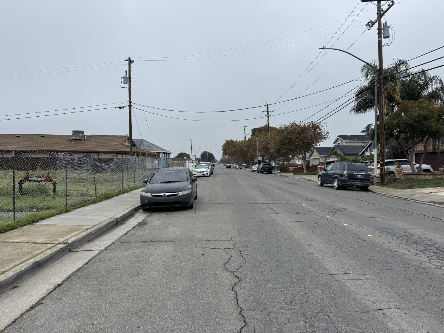 262 Clover Road Tracy, CA 95376 - Photo 9 of 15 a car parked on the side of a street