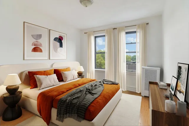 a bedroom with bed and a window