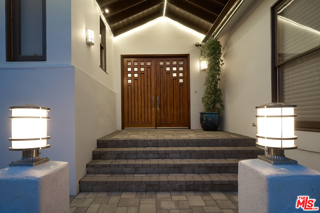 8647 Edwin Drive Los Angeles, CA 90046 - Photo 31 of 32 a front view of a house with entryway