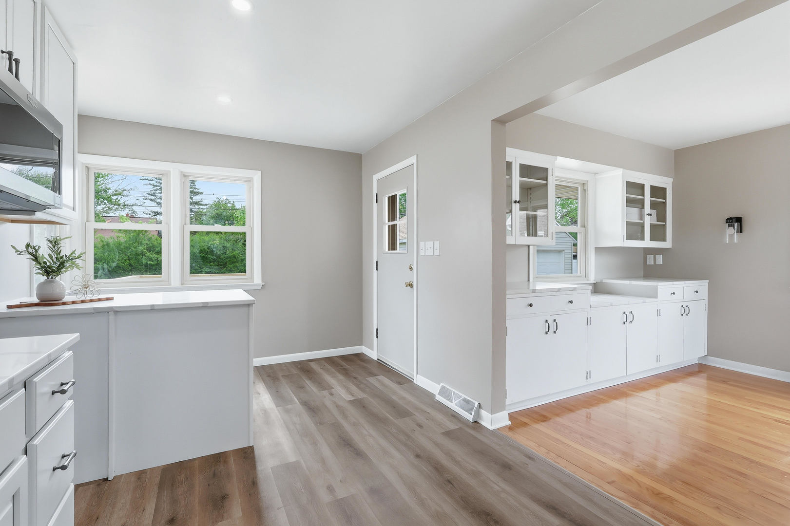 2528 28th Street Moline, IL 61265 - Photo 12 of 35 a view of a kitchen with wooden floor and a window