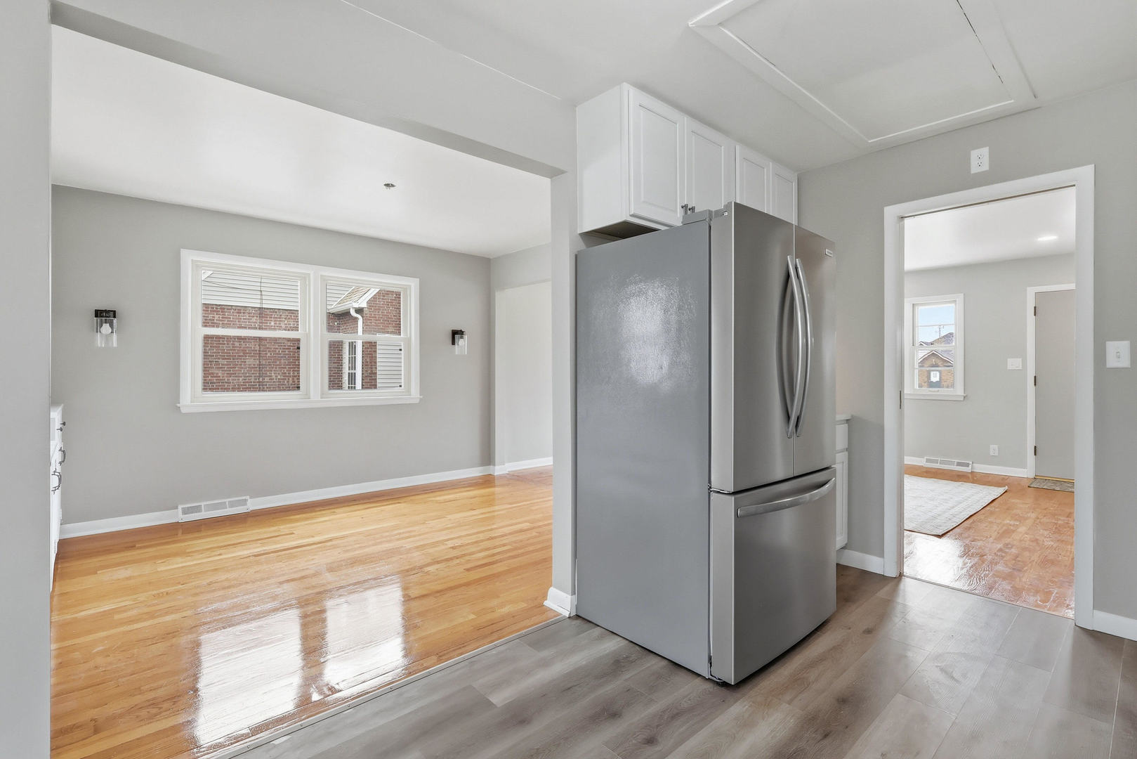 2528 28th Street Moline, IL 61265 - Photo 13 of 35 a view of a refrigerator in kitchen and wooden floor
