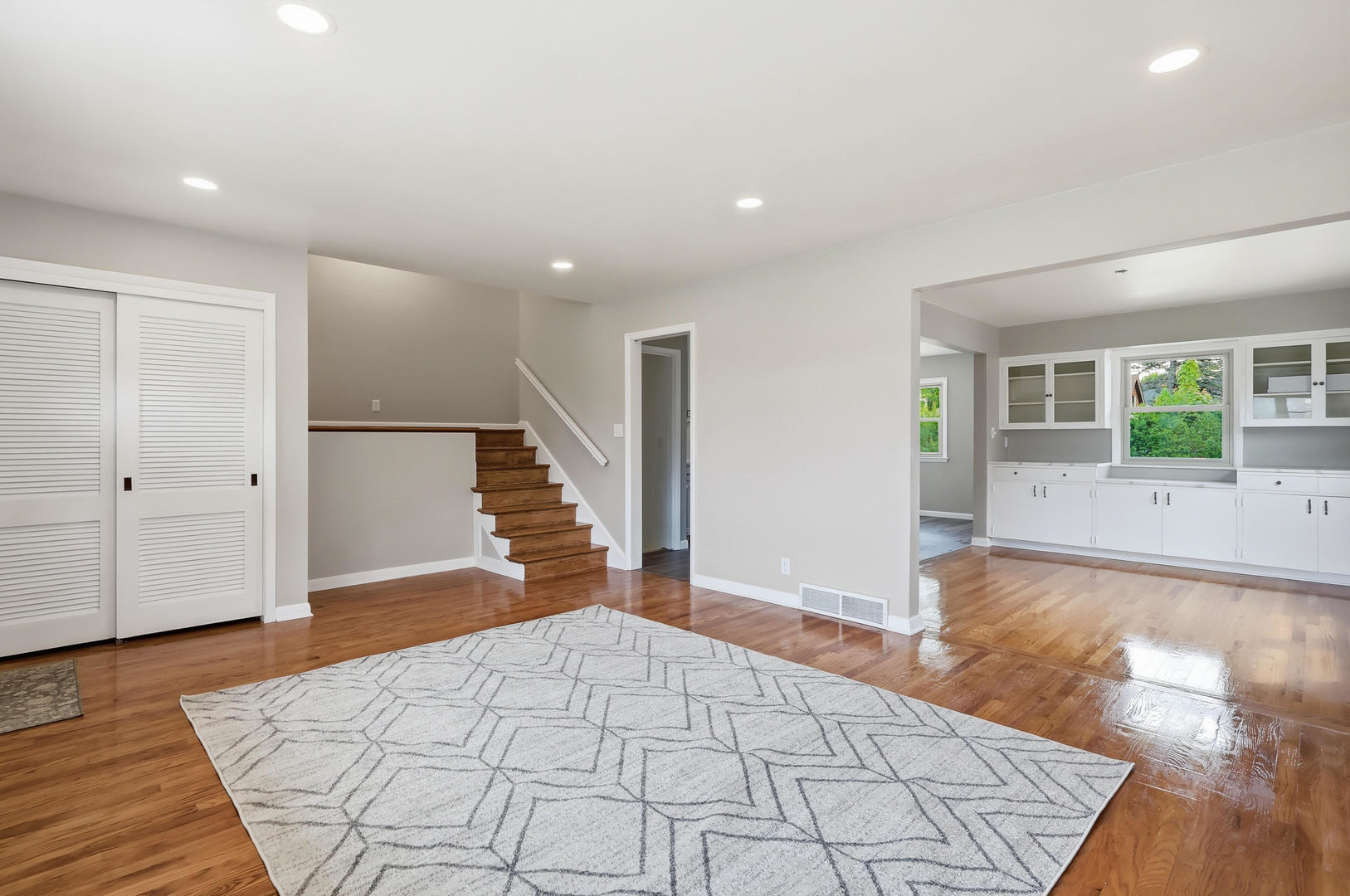 2528 28th Street Moline, IL 61265 - Photo 8 of 35 a view of a hallway with wooden floor and staircase