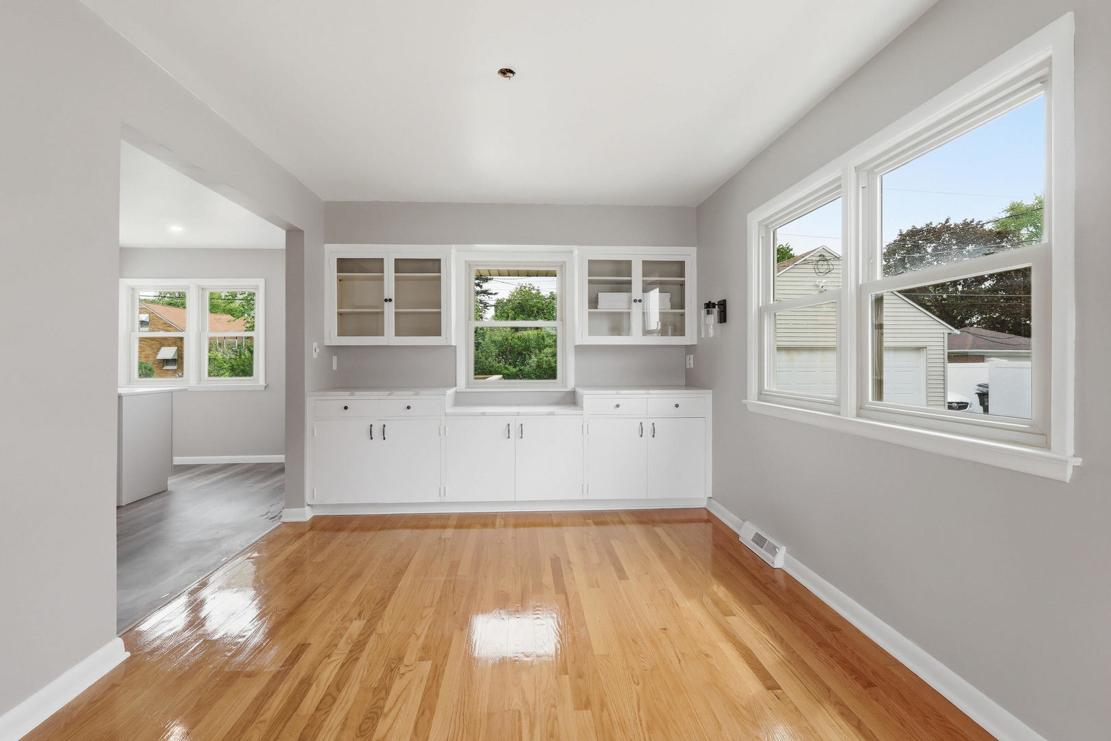 2528 28th Street Moline, IL 61265 - Photo 10 of 35 wooden floor in an empty room with a window
