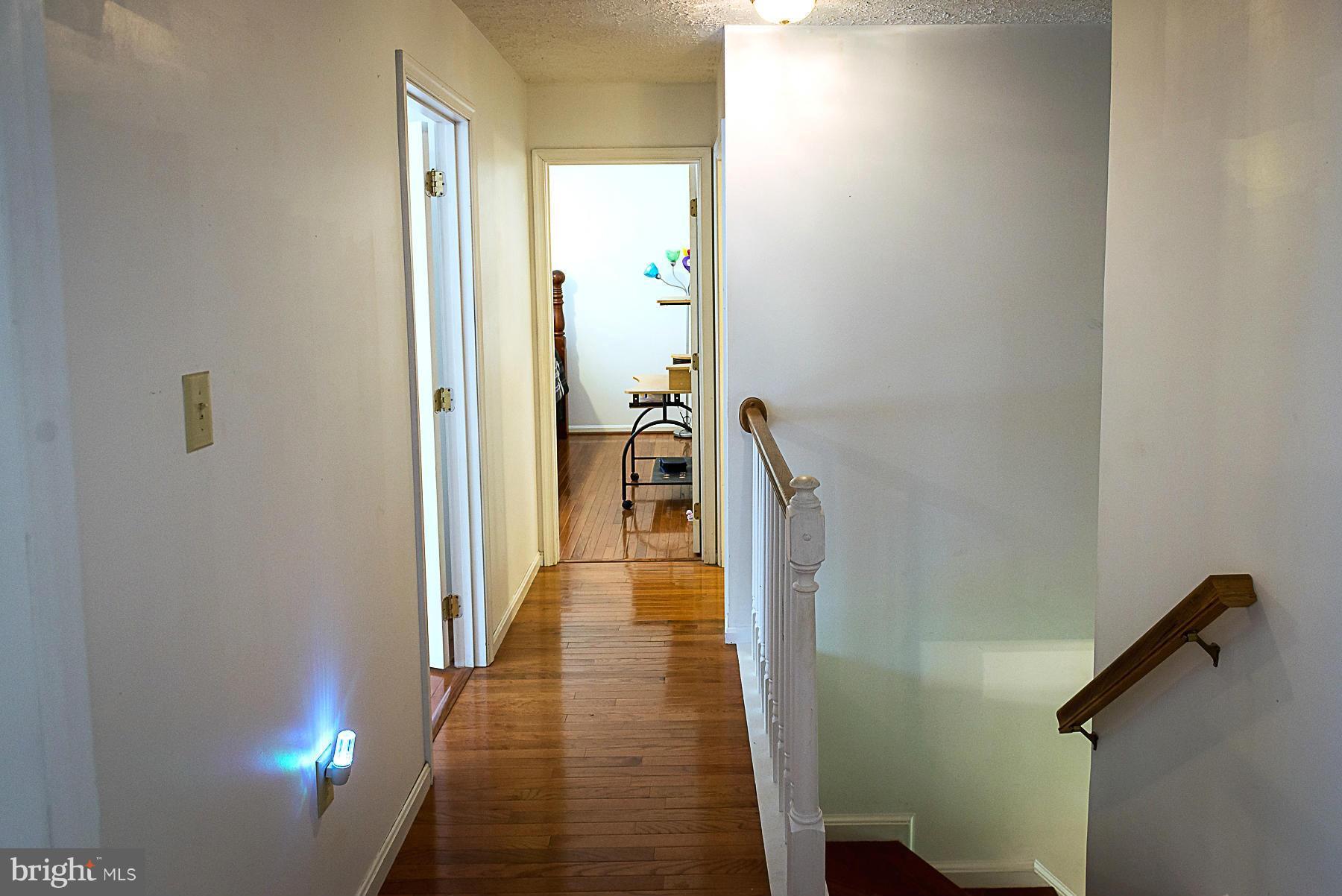 7105 Henson Landing Road Welcome, MD 20693 - Photo 23 of 30 Upper level hallway