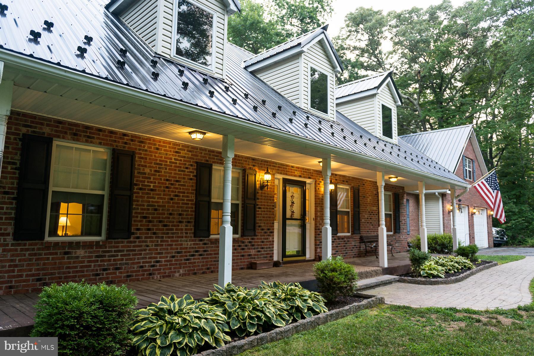 7105 Henson Landing Road Welcome, MD 20693 - Photo 25 of 30 Country front porch across front of home