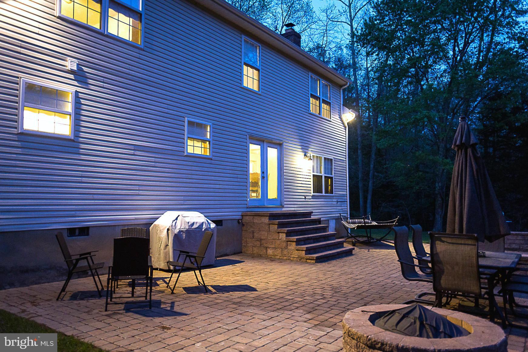 7105 Henson Landing Road Welcome, MD 20693 - Photo 27 of 30 Large custom patio area with fire pit