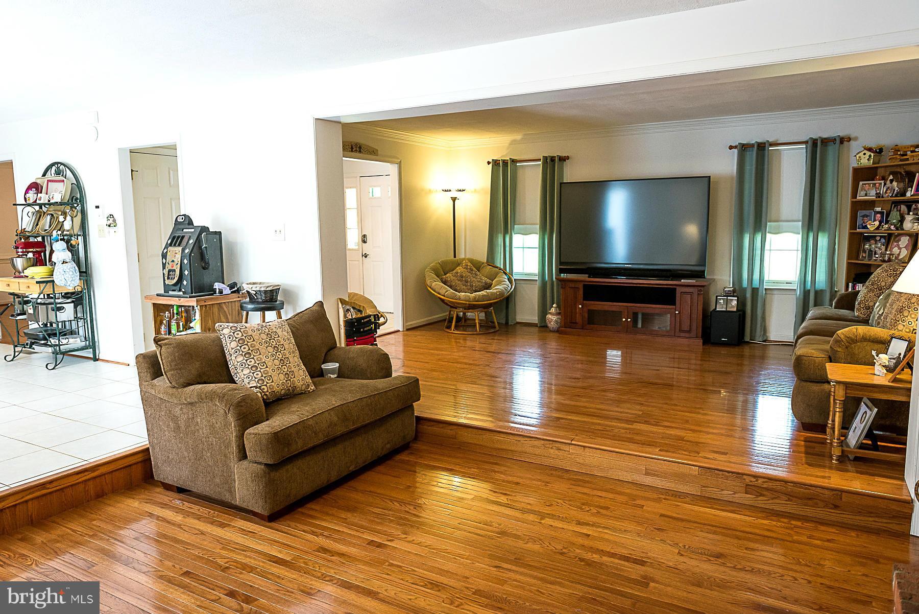 7105 Henson Landing Road Welcome, MD 20693 - Photo 4 of 30 Step down Family Room with fireplace
