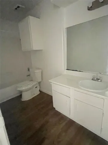 a bathroom with a sink and a toilet