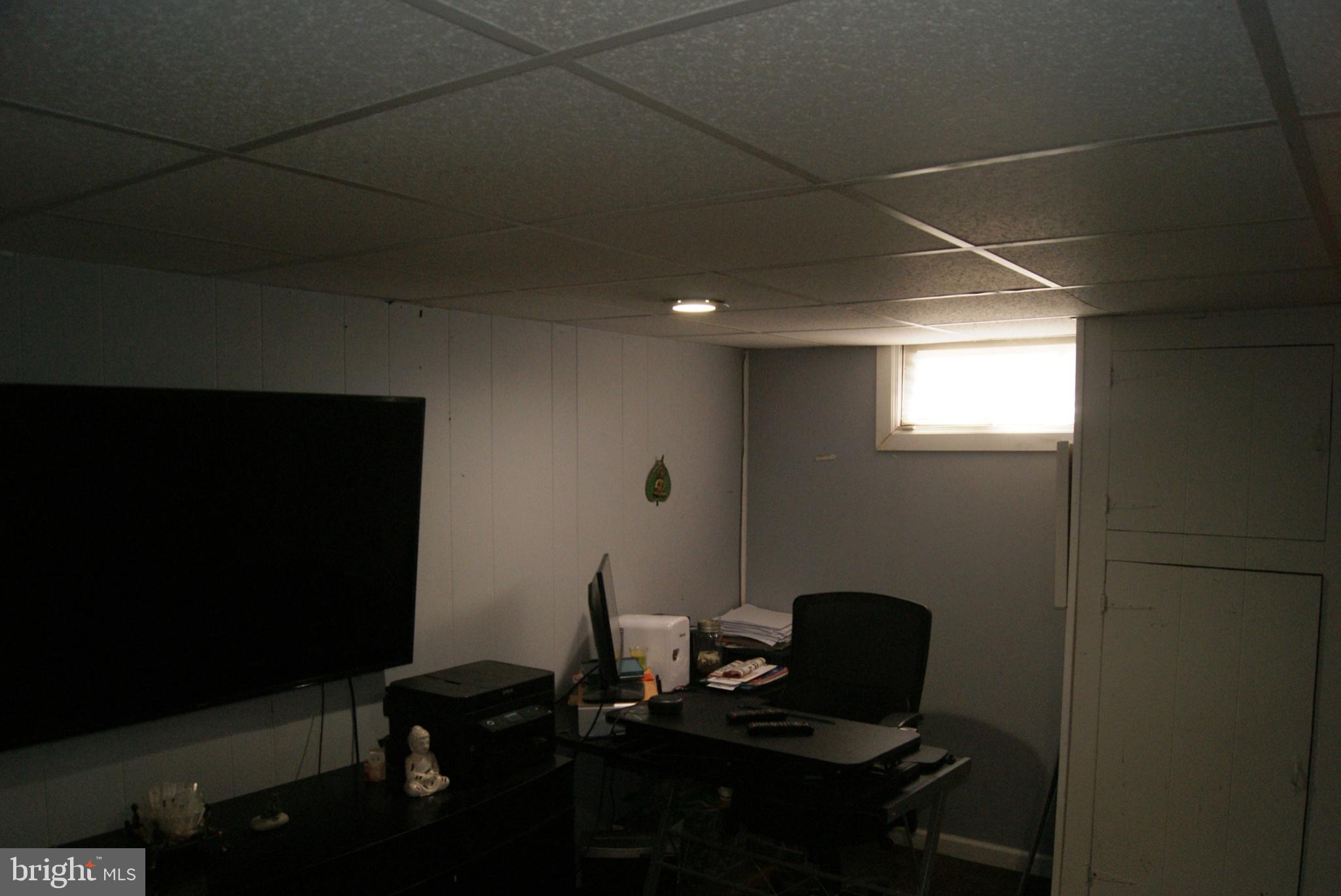 735 Grant Road Folcroft, PA 19032 - Photo 33 of 57 Cozy basement workspace with natural light.