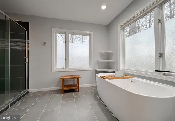 a bathroom with a sink double vanity and a toilet