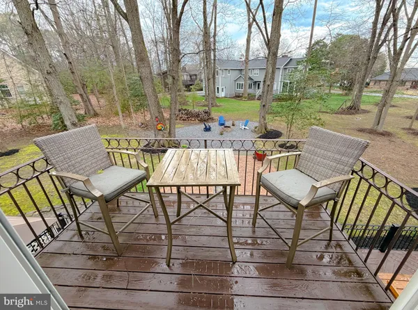 a view of a lake with a yard