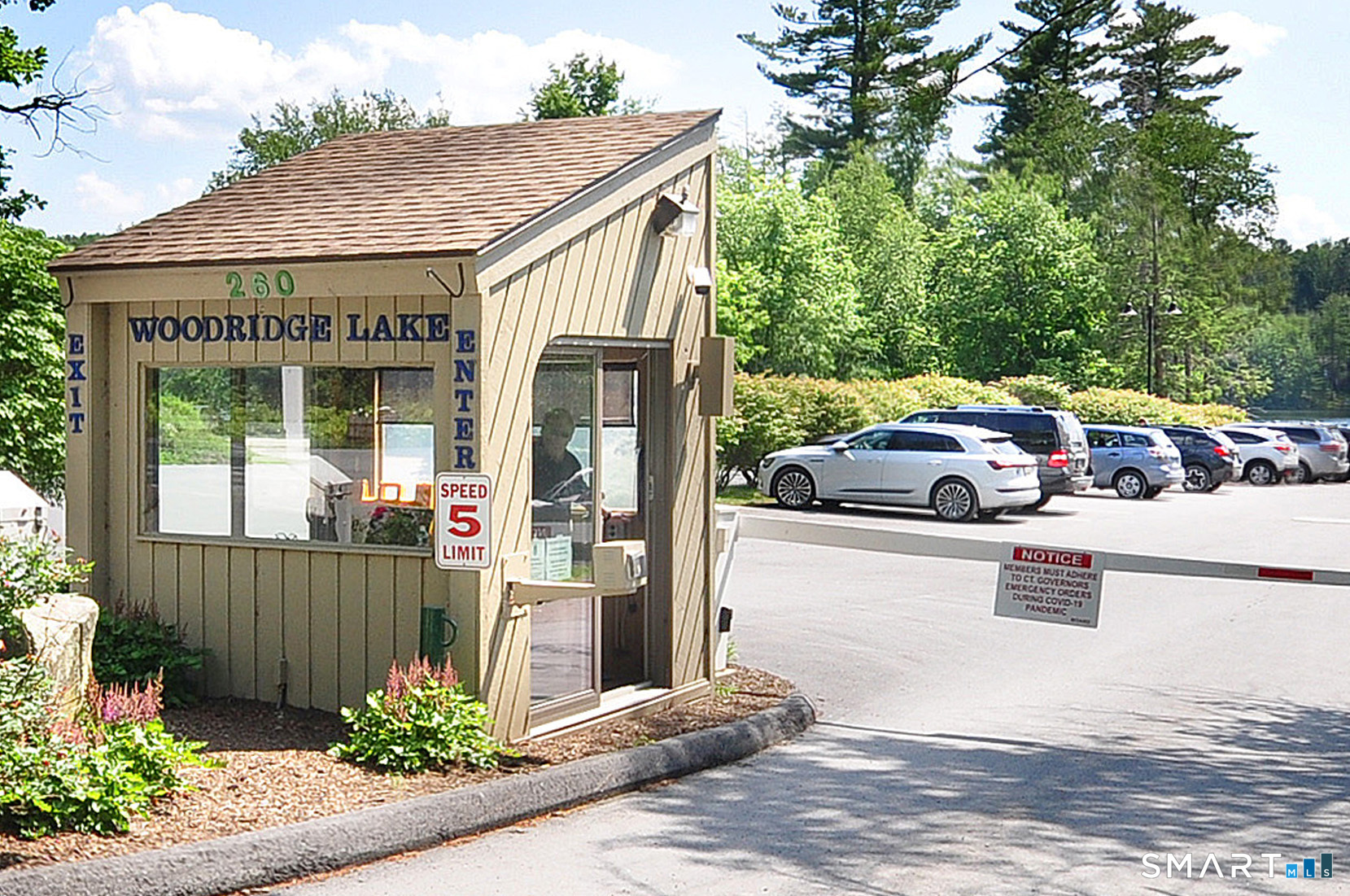 Ashley Drive Goshen, CT 06756 - Photo 10 of 22 a front view of a house with a garden