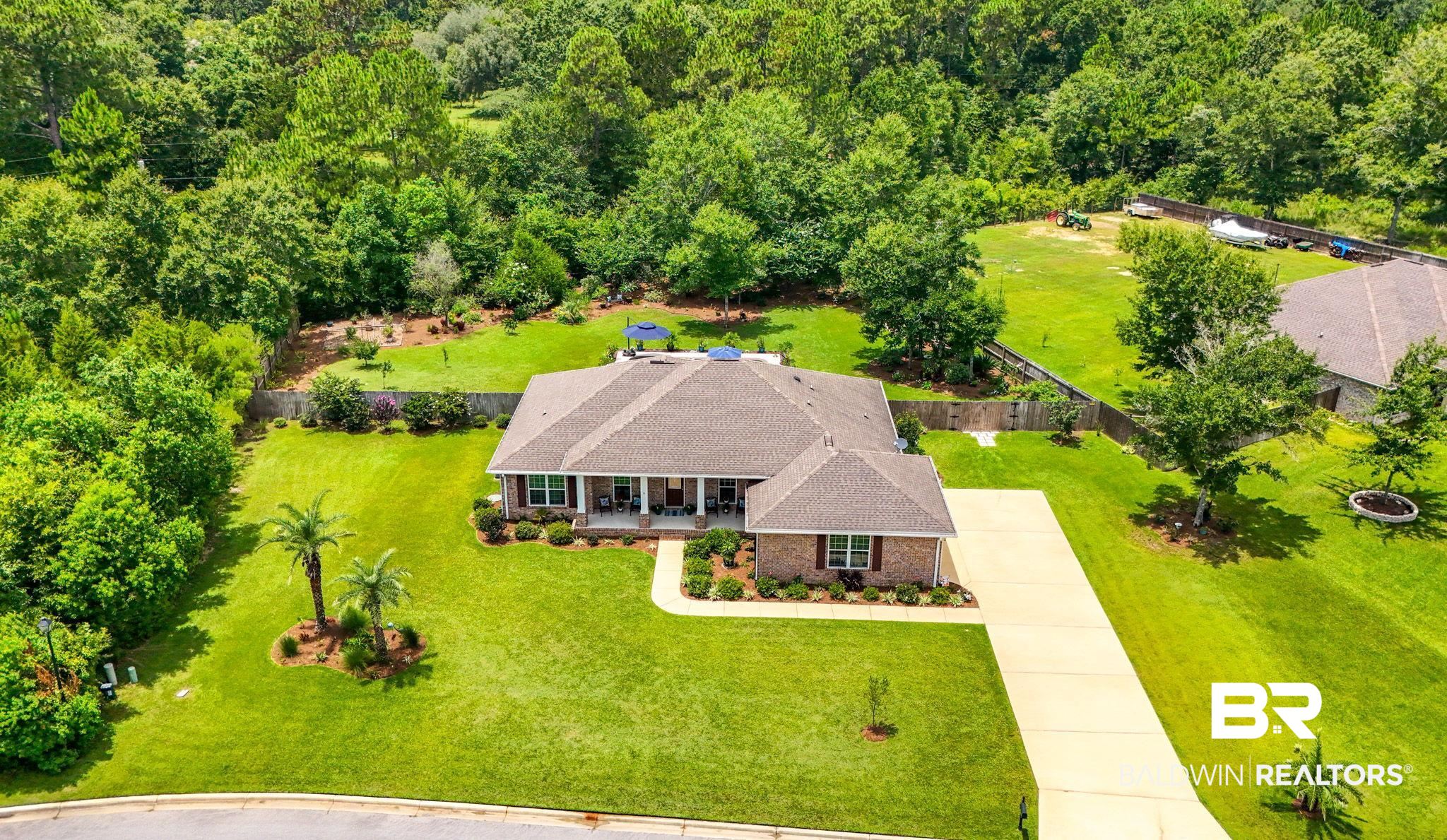 10473 Lyttleton Loop Lillian, AL 36549 - Photo 55 of 57 View from above of property featuring a heavily wooded area