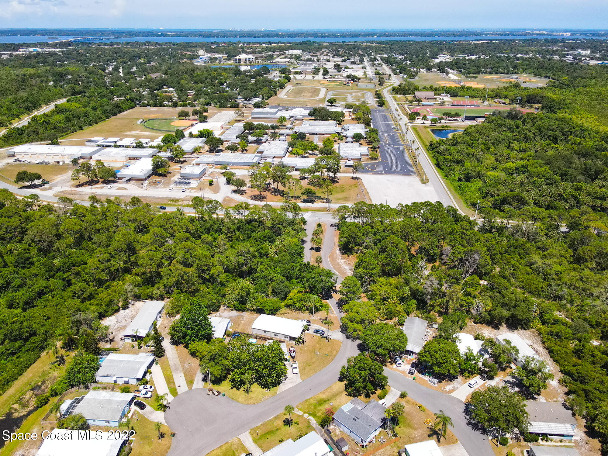 0 North Range Road Cocoa, FL 32926 - Photo 7 of 24 an aerial view of residential houses with outdoor space