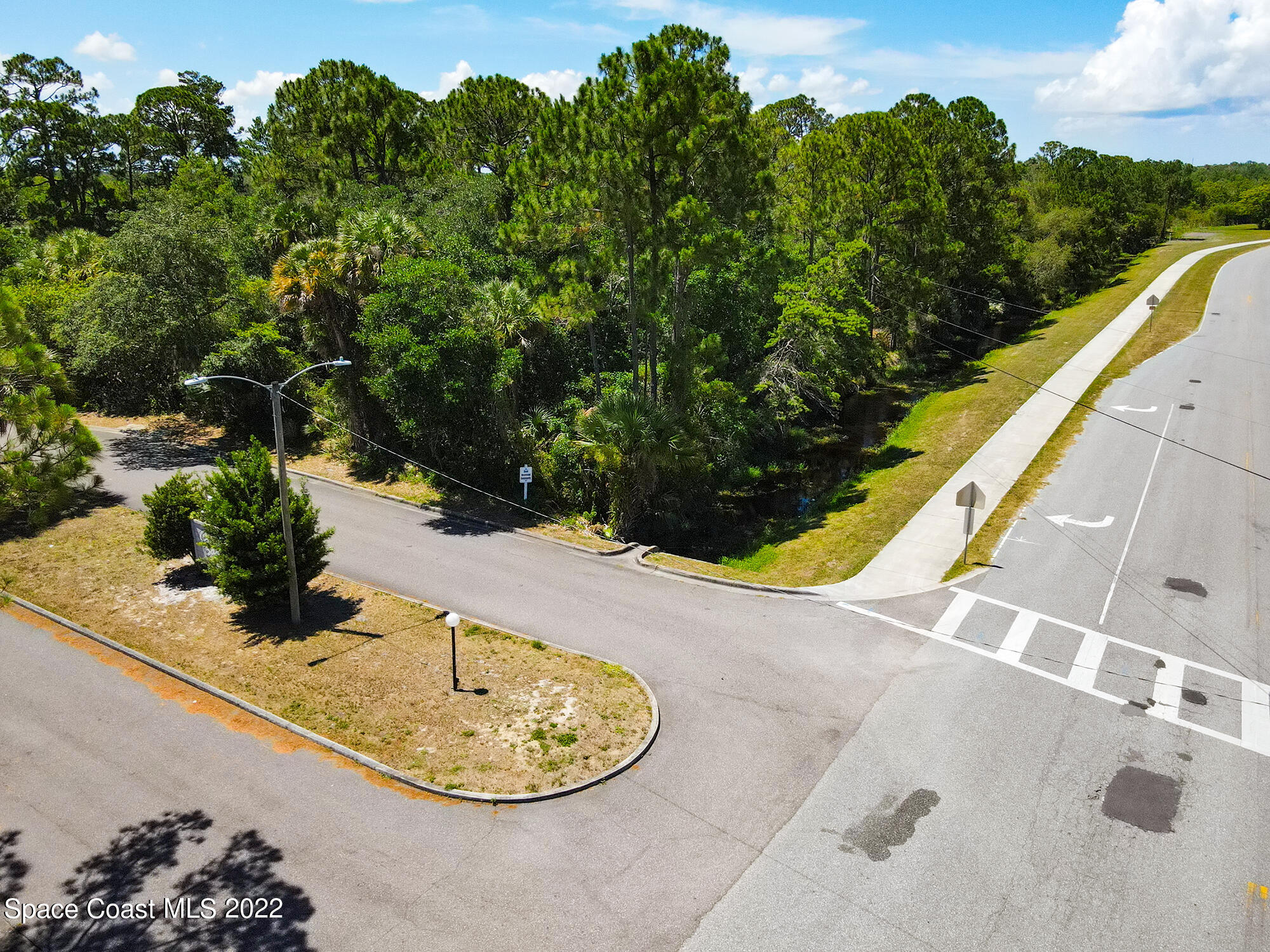0 North Range Road Cocoa, FL 32926 - Photo 10 of 24 a view of a swimming pool with a yard
