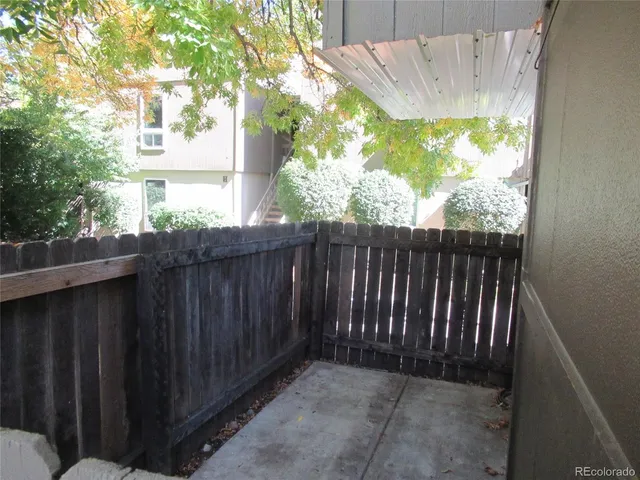 a view of a wooden fence