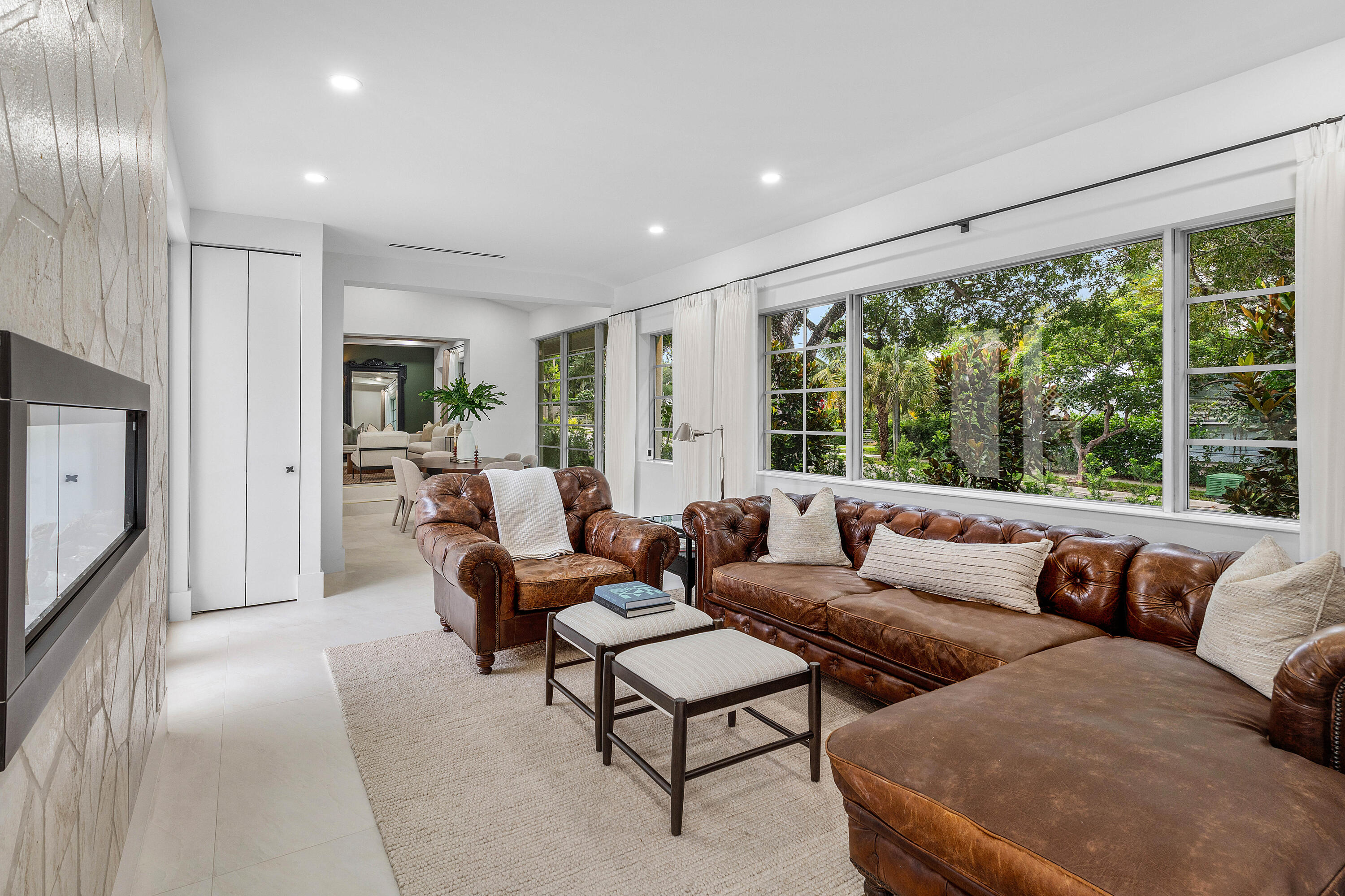 2330 Lake Avenue, Unit 2330 West Palm Beach, FL 33401 - Photo 17 of 44 a living room with furniture and a flat screen tv