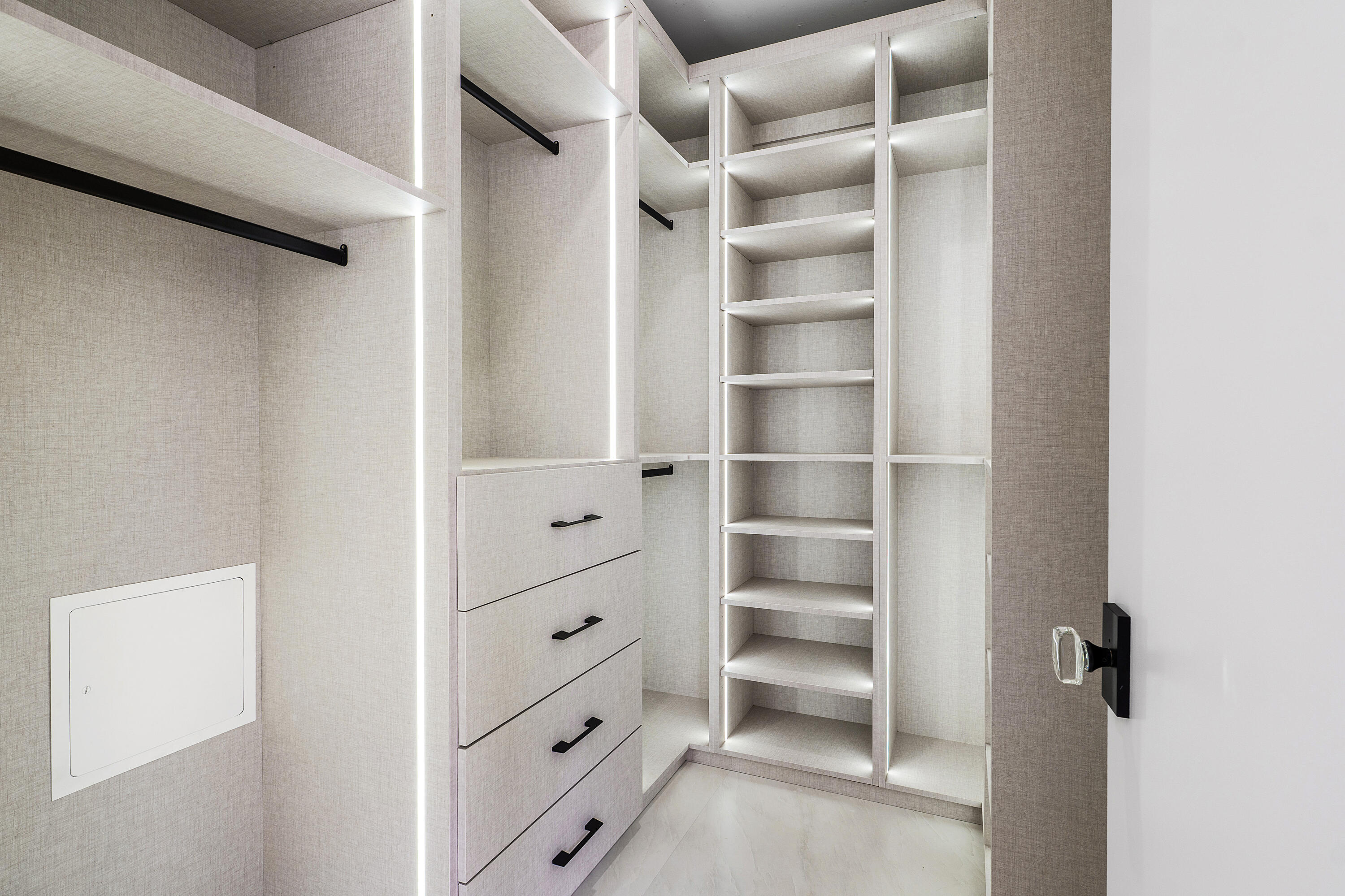 2330 Lake Avenue, Unit 2330 West Palm Beach, FL 33401 - Photo 21 of 44 a view of walk in closet with empty racks