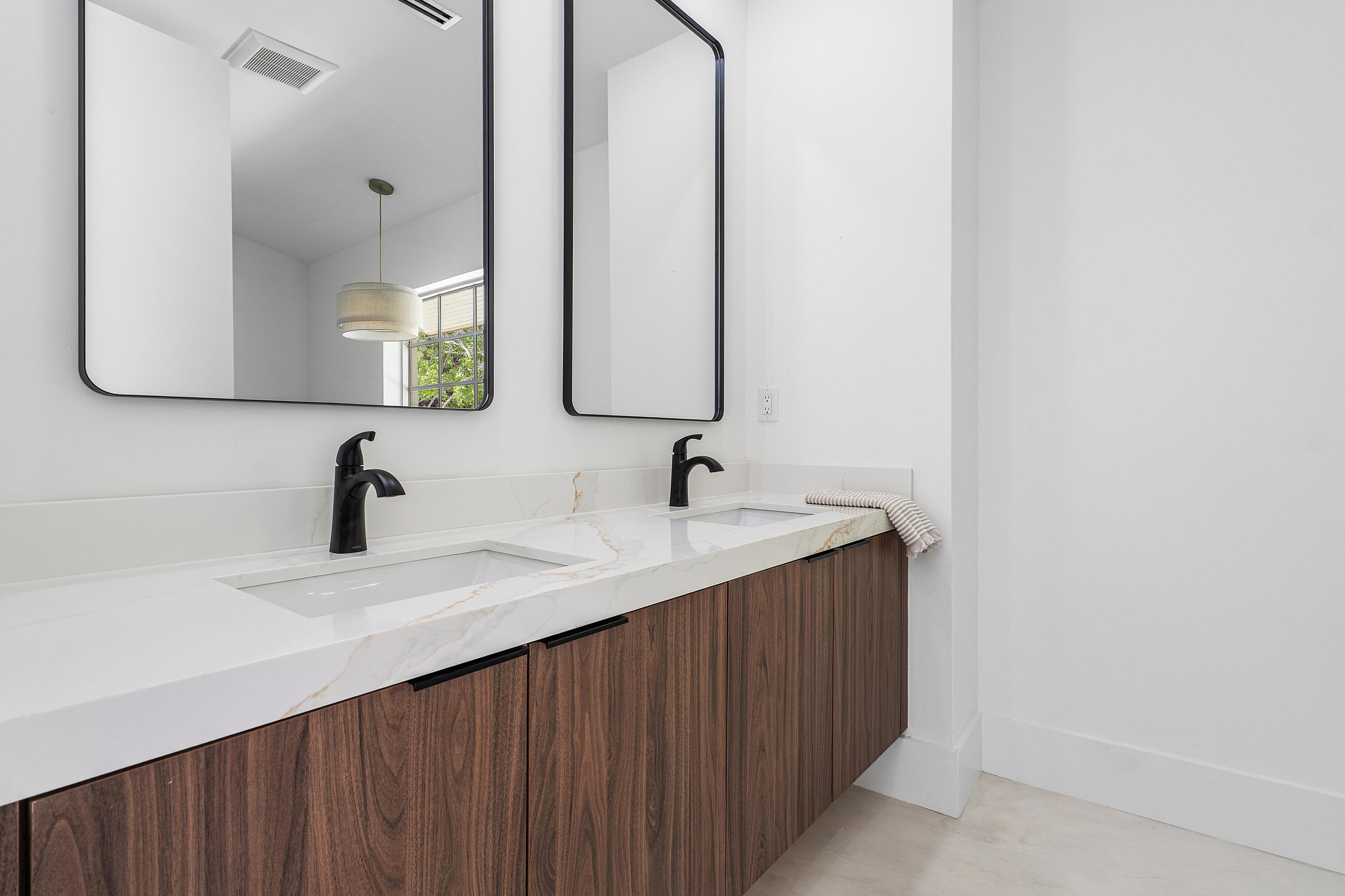 2330 Lake Avenue, Unit 2330 West Palm Beach, FL 33401 - Photo 24 of 44 a bathroom with a sink and a mirror