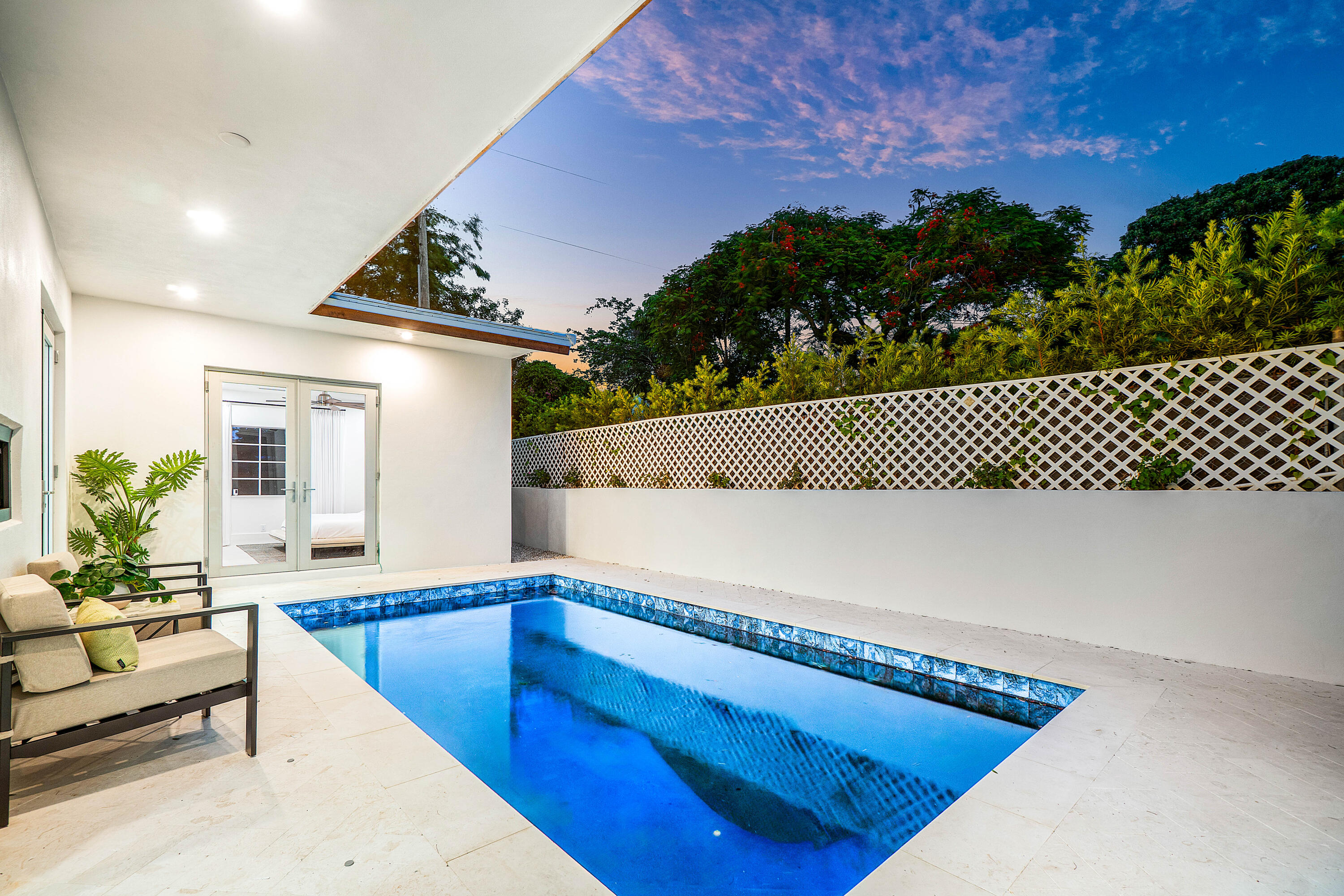 2330 Lake Avenue, Unit 2330 West Palm Beach, FL 33401 - Photo 35 of 44 a view of a living room and floor to ceiling window