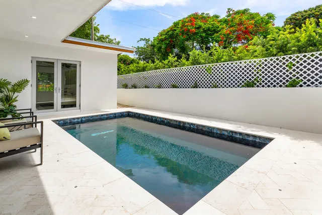 a view of swimming pool from a balcony