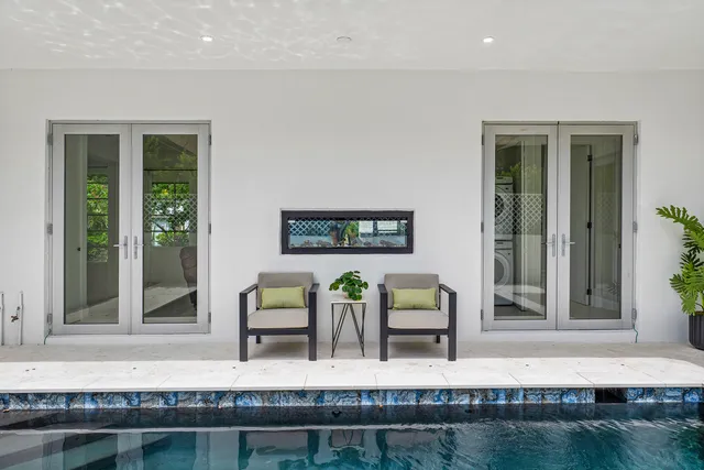 a view of living room with furniture and window