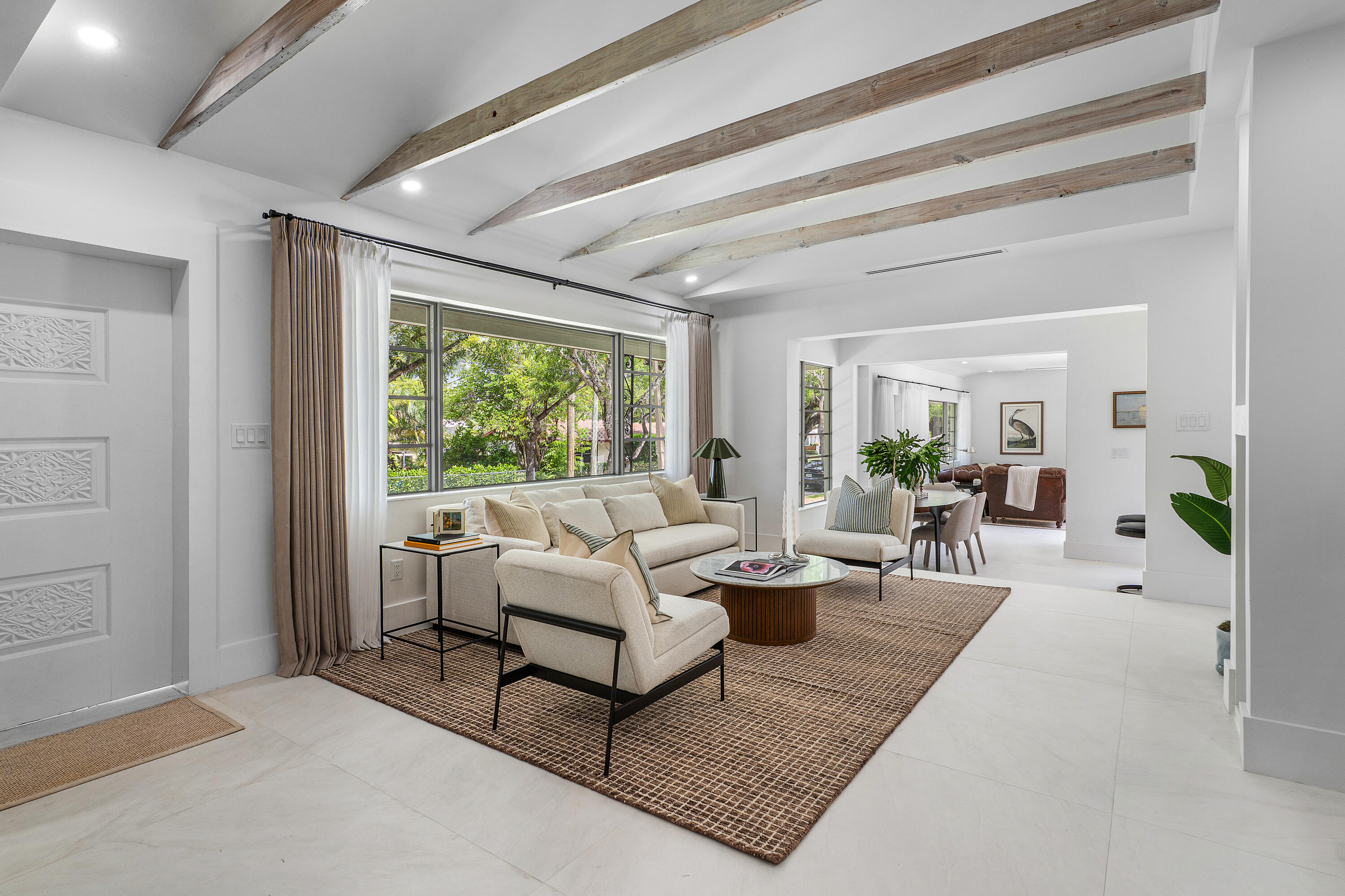 2330 Lake Avenue, Unit 2330 West Palm Beach, FL 33401 - Photo 5 of 44 a living room with furniture and a large window